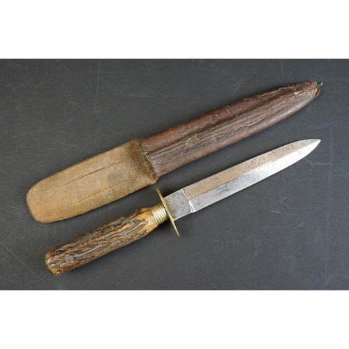 57 - A Hunting / Fighting knife by W. Singleton & Co. of Sheffield, with antler handle and leather scabba... 