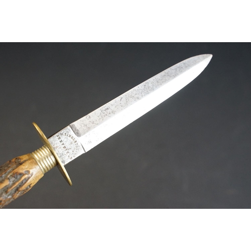 57 - A Hunting / Fighting knife by W. Singleton & Co. of Sheffield, with antler handle and leather scabba... 