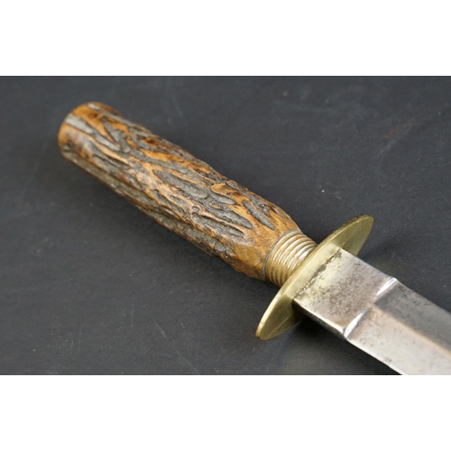 57 - A Hunting / Fighting knife by W. Singleton & Co. of Sheffield, with antler handle and leather scabba... 