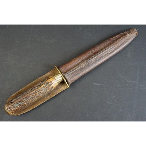 57 - A Hunting / Fighting knife by W. Singleton & Co. of Sheffield, with antler handle and leather scabba... 