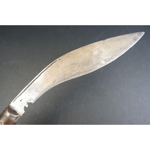 58 - A British World War Two / WW2 military issue Gurkha kukri with leather scabbard, the blade marked 41... 