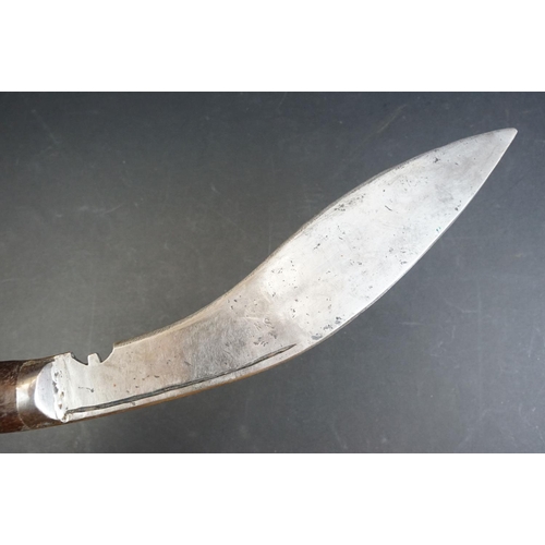 58 - A British World War Two / WW2 military issue Gurkha kukri with leather scabbard, the blade marked 41... 