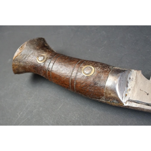 58 - A British World War Two / WW2 military issue Gurkha kukri with leather scabbard, the blade marked 41... 