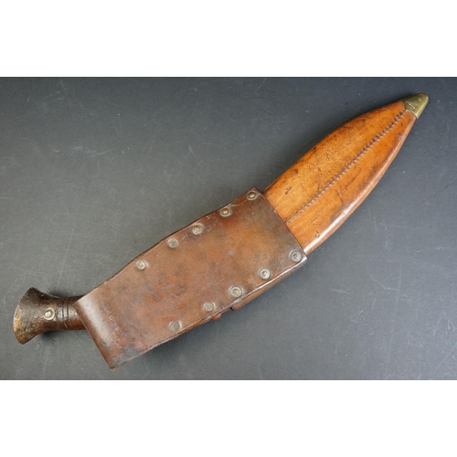 58 - A British World War Two / WW2 military issue Gurkha kukri with leather scabbard, the blade marked 41... 