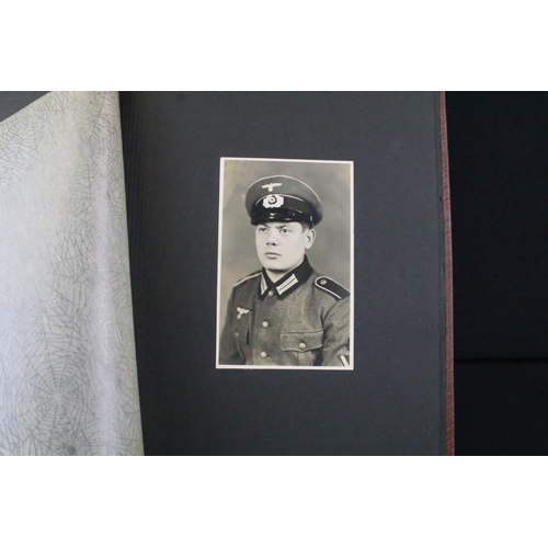 61 - A Genuine World War Two German soldiers photograph album complete with contents of seventy two photo... 