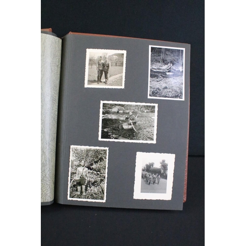 61 - A Genuine World War Two German soldiers photograph album complete with contents of seventy two photo... 