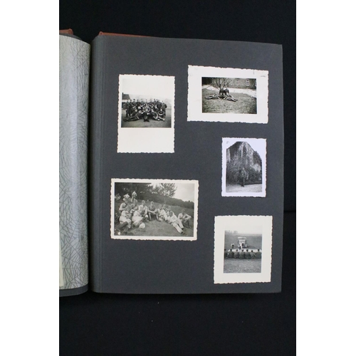 61 - A Genuine World War Two German soldiers photograph album complete with contents of seventy two photo... 