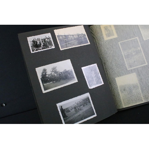 61 - A Genuine World War Two German soldiers photograph album complete with contents of seventy two photo... 