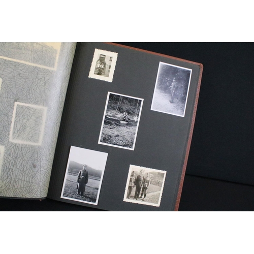 61 - A Genuine World War Two German soldiers photograph album complete with contents of seventy two photo... 