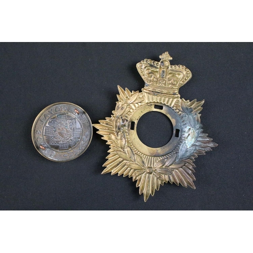 62 - A British army Queens Crown brass helmet plate badge to The Royal Scots Regiment with lug fixings to... 