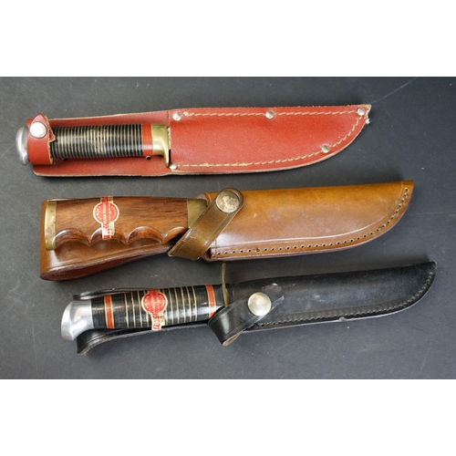 73 - A collection of three William Rogers of Sheffield, British made scouting / hunting knives, all compl... 