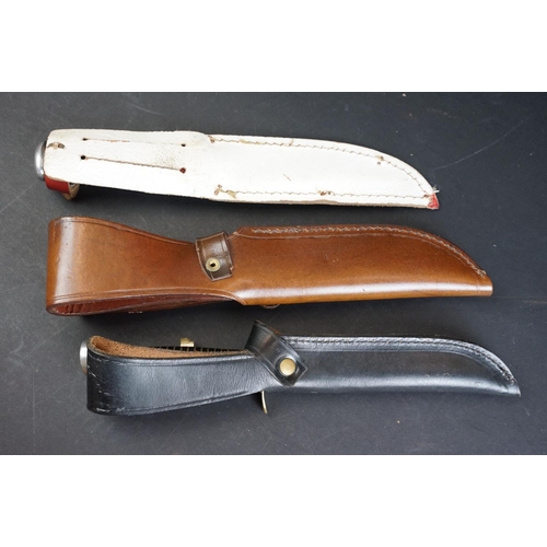 73 - A collection of three William Rogers of Sheffield, British made scouting / hunting knives, all compl... 