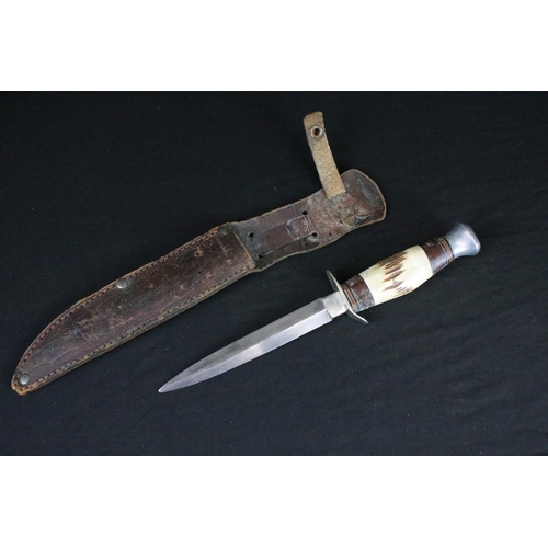 77 - Two vintage William Rogers of Sheffield, British made scouting / hunting knives, both with antler ha... 