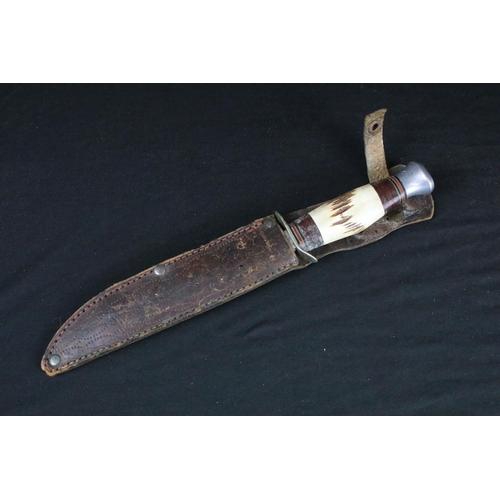 77 - Two vintage William Rogers of Sheffield, British made scouting / hunting knives, both with antler ha... 