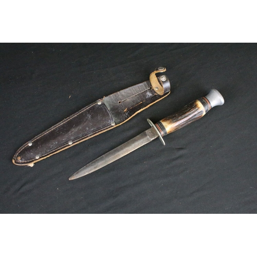 77 - Two vintage William Rogers of Sheffield, British made scouting / hunting knives, both with antler ha... 