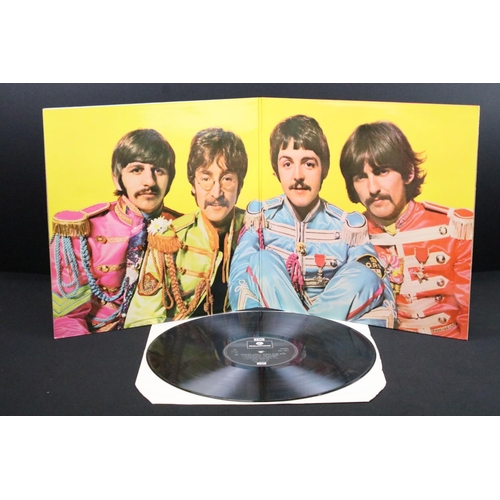 171 - Vinyl - 3 The Beatles LPs to include Sgt Pepper x 2 and Magical Mystery Tour.  First Sgt Pepper is o... 