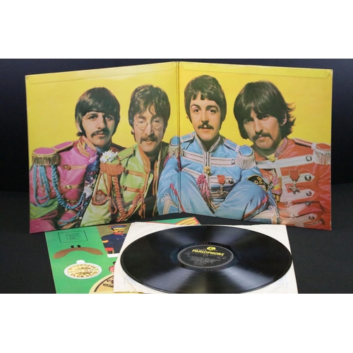 171 - Vinyl - 3 The Beatles LPs to include Sgt Pepper x 2 and Magical Mystery Tour.  First Sgt Pepper is o... 