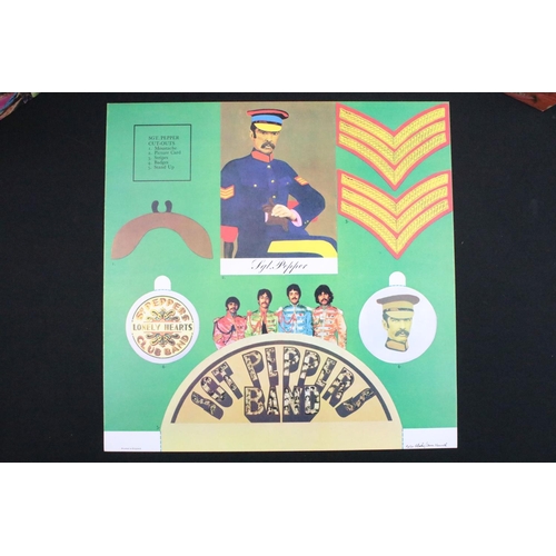 171 - Vinyl - 3 The Beatles LPs to include Sgt Pepper x 2 and Magical Mystery Tour.  First Sgt Pepper is o... 