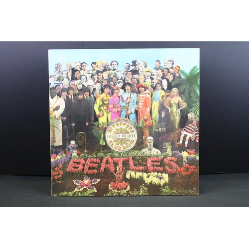 171 - Vinyl - 3 The Beatles LPs to include Sgt Pepper x 2 and Magical Mystery Tour.  First Sgt Pepper is o... 