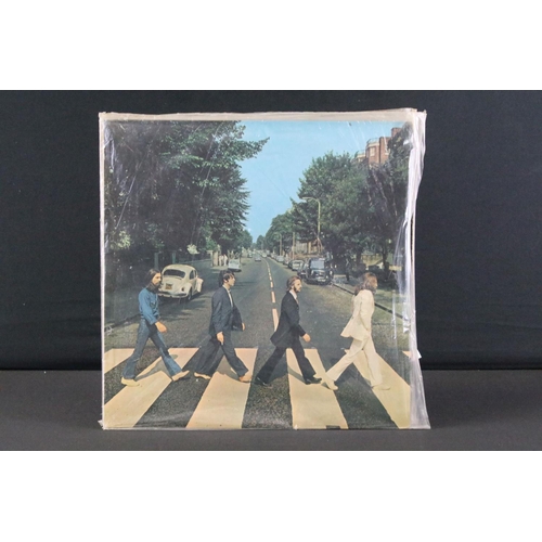 269 - Vinyl - 27 Beatles & Members LPs to include Abbey Road (misaligned apple), Let It Be (green apple), ... 