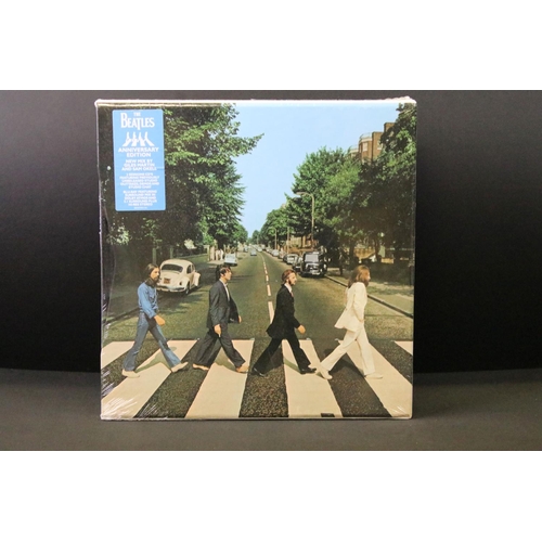 80 - Vinyl / CD's - The Beatles, one box set and 3 LPs to include: Abbey Road (Apple Records – 0602577921... 