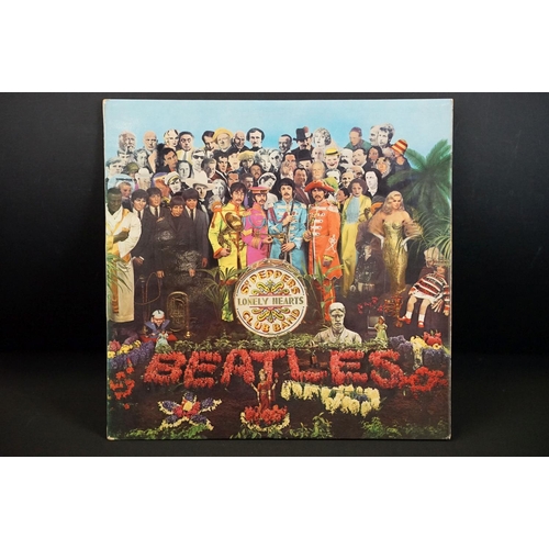 131 - Vinyl - 9 LPs to include The Beatles x 5, Gram Parsons x 3, Flying Burrito Brothers.  Titles are Rub... 