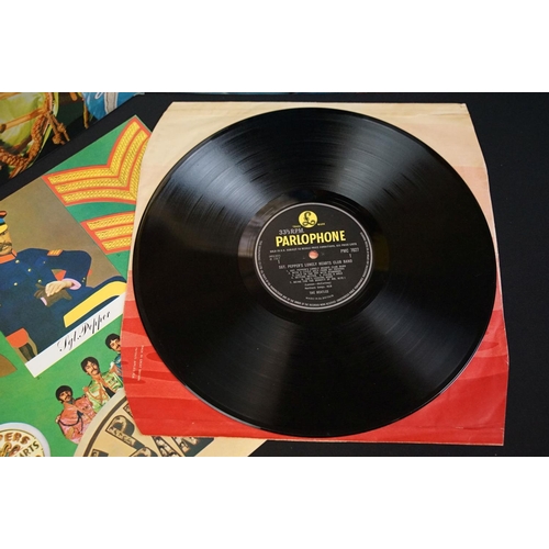 131 - Vinyl - 9 LPs to include The Beatles x 5, Gram Parsons x 3, Flying Burrito Brothers.  Titles are Rub... 