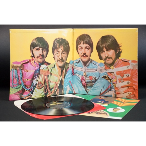 12 - Vinyl - The Beatles - Sgt. Pepper's Lonely Hearts Club Band LP on Parlophone Records, PMC 7027. Orig... 