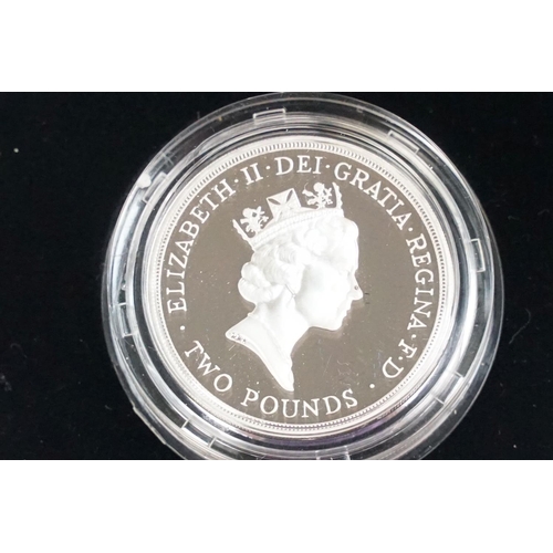 103 - A collection of three Royal Mint Queen Elizabeth II £2 silver proof coins to include 1995, 2015 and ... 