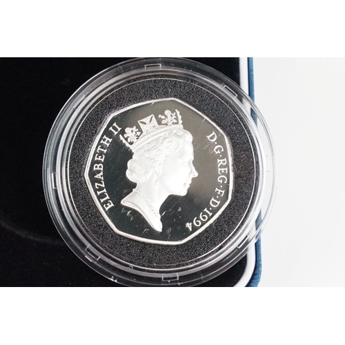 106 - A collection of four Royal Mint Queen Elizabeth II 50p silver proof coins to include 2000, 1998, 199... 