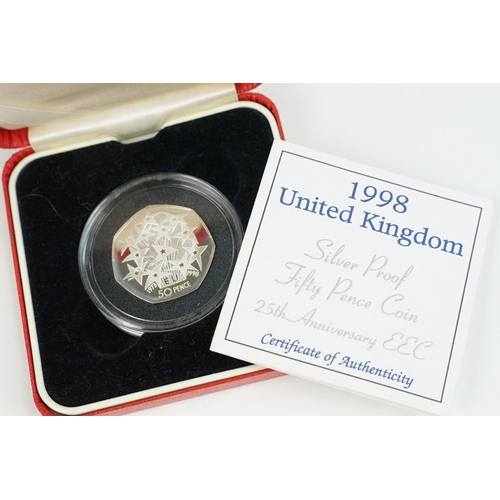 106 - A collection of four Royal Mint Queen Elizabeth II 50p silver proof coins to include 2000, 1998, 199... 