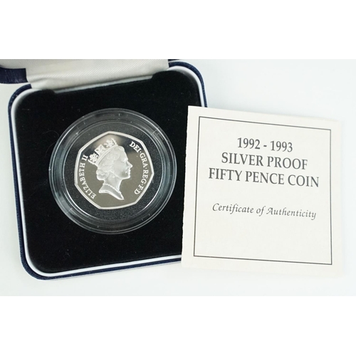 107 - A collection of four Royal Mint Queen Elizabeth II 50p silver proof coins to include 1997, 1993, 200... 