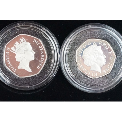 108 - A collection of four Royal Mint Queen Elizabeth II 50p silver proof coins to include 2003, 2 x 1992 ... 