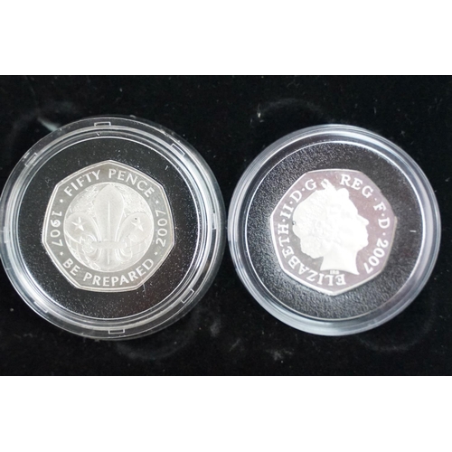 108 - A collection of four Royal Mint Queen Elizabeth II 50p silver proof coins to include 2003, 2 x 1992 ... 