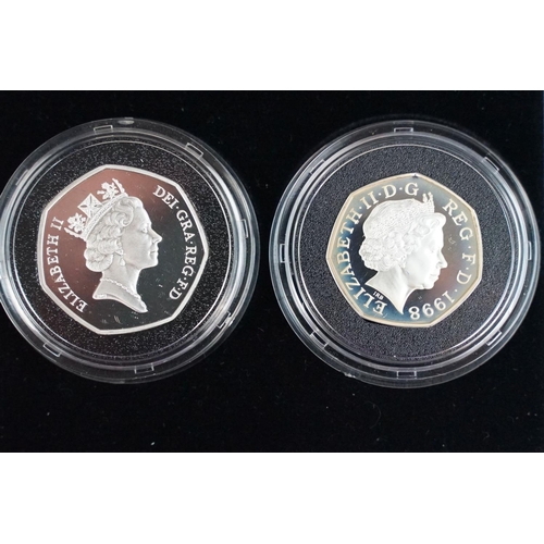 108 - A collection of four Royal Mint Queen Elizabeth II 50p silver proof coins to include 2003, 2 x 1992 ... 