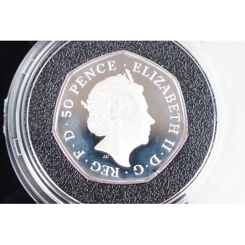 110 - A collection of four Royal Mint Queen Elizabeth II 50p silver proof coins to include 2014, 2015, 201... 