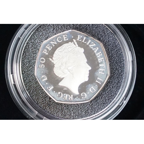 111 - A collection of four Royal Mint Queen Elizabeth II 50p silver proof coins to include 2015, 2016, 201... 