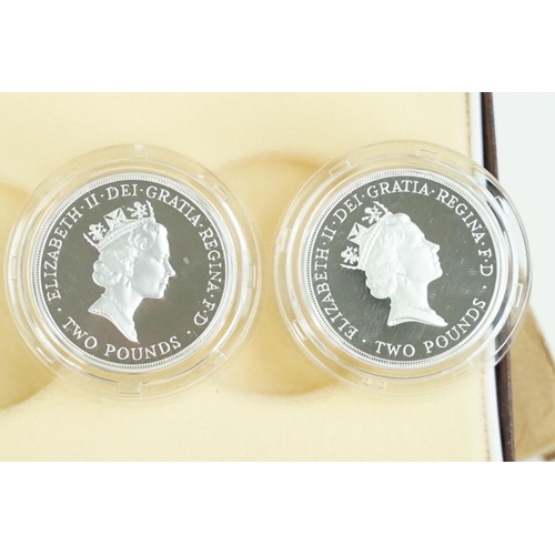 114 - A collection of four Royal Mint Queen Elizabeth II £2 silver proof coin two coin sets to include 198... 