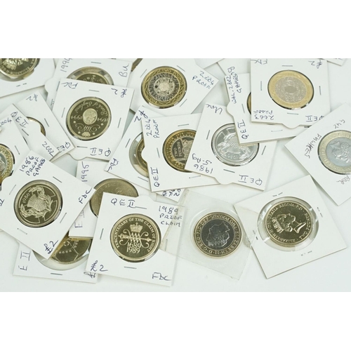 118 - A large collection of United Kingdom mainly uncirculated £2 coins within card coin sleeves.