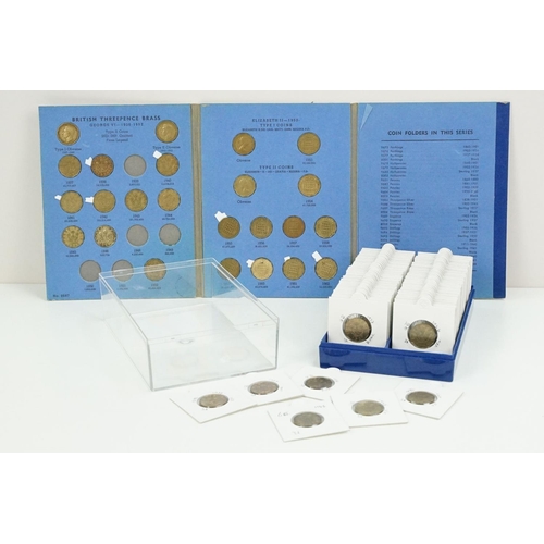 121 - A large collection of Royal Mint United Kingdom brass threepence coins within coin sleeves and toget... 