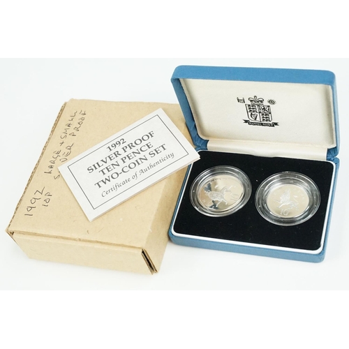 123 - A collection of Royal Mint United Kingdom silver proof coins to include £5, 5p, 10p and 20p examples... 