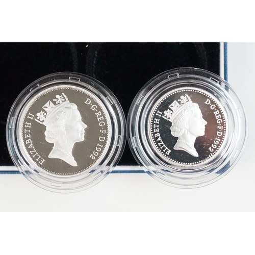 123 - A collection of Royal Mint United Kingdom silver proof coins to include £5, 5p, 10p and 20p examples... 