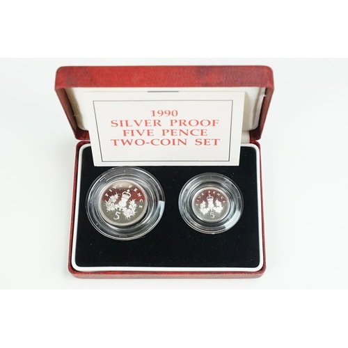 123 - A collection of Royal Mint United Kingdom silver proof coins to include £5, 5p, 10p and 20p examples... 