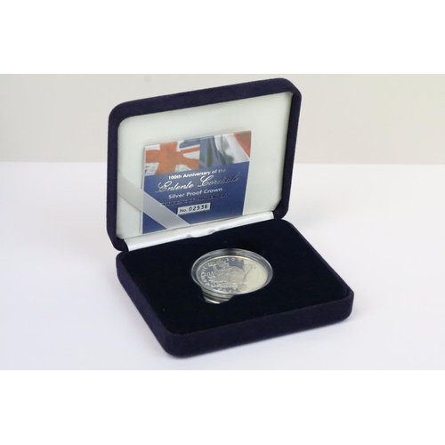 127 - A collection of four Royal Mint Queen Elizabeth II £5 silver proof coins to include 1990, 2004, 2015... 