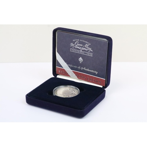129 - A collection of four Royal Mint Queen Elizabeth II £5 silver proof coins to include 2005, 2016, 2002... 