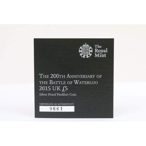 130 - A collection of four Royal Mint Queen Elizabeth II £5 silver proof coins to include 2015, 2017, 2016... 