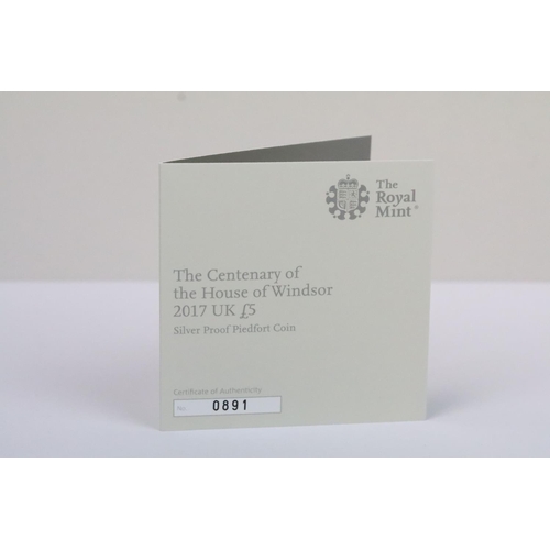 131 - A collection of four Royal Mint Queen Elizabeth II £5 silver proof coins to include 2018, 2015, 2014... 