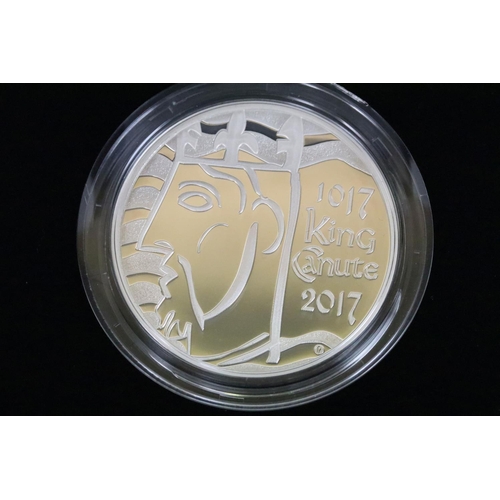 136 - A collection of four Royal Mint Queen Elizabeth II £5 silver proof coins to include 2013, 2014, 2017... 