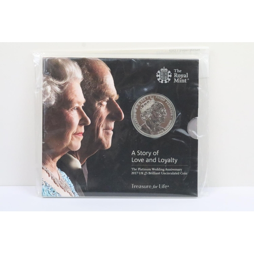 137 - A collection of eleven Royal Mint brilliant uncirculated United Kingdom £5 and Crown collectors coin... 