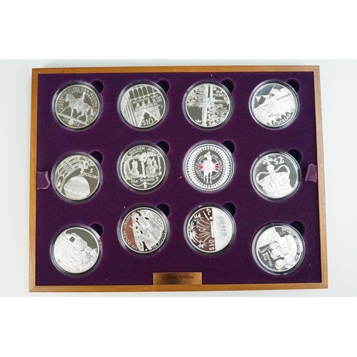 155 - A Royal Mint Queen Elizabeth II 2002 Golden Jubilee coin set, comprising of twenty four silver proof... 